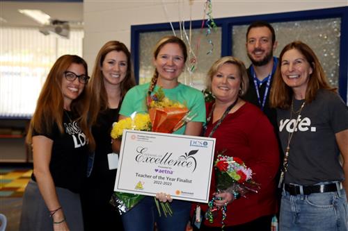 Jaclyn Reyes and staff.jpg